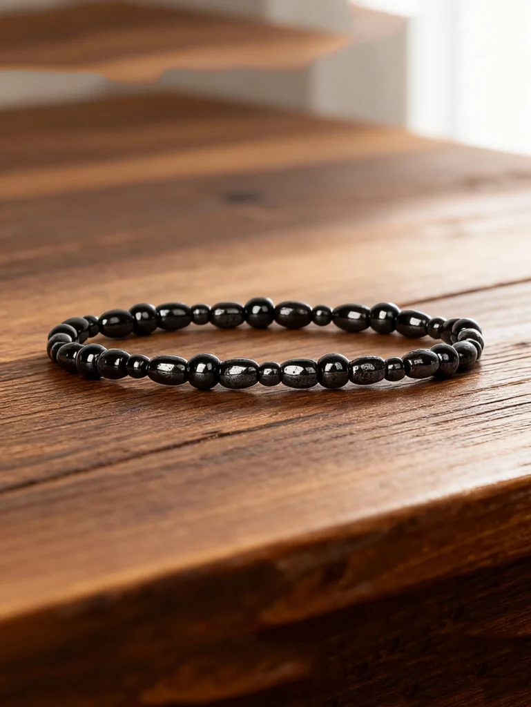 Hematite Stone Bracelet with Gold Spacers and Leather Cord