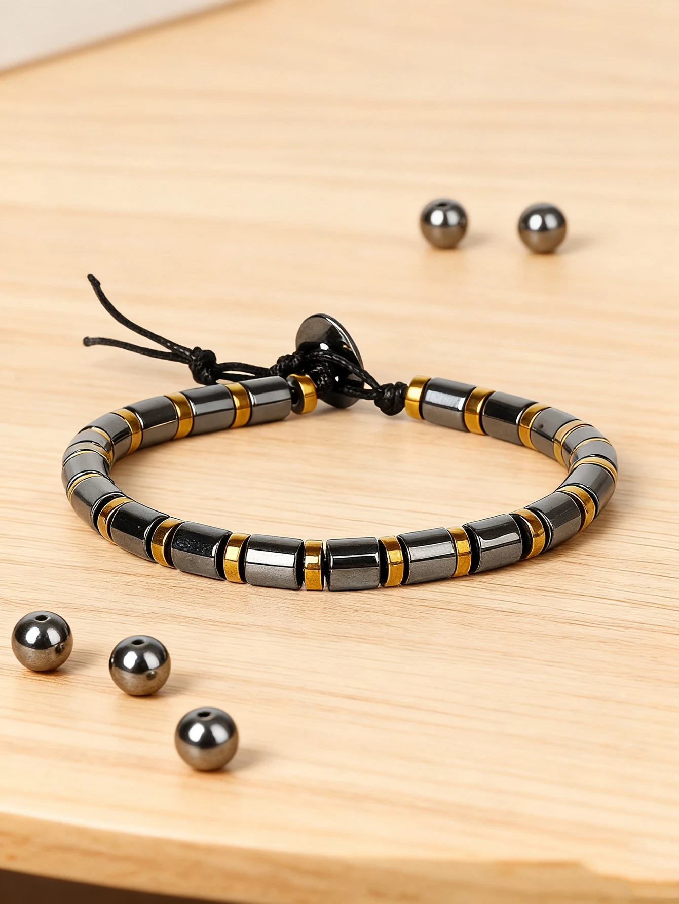 Hematite Stone Bracelet with Gold Spacers and Leather Cord - Image 3