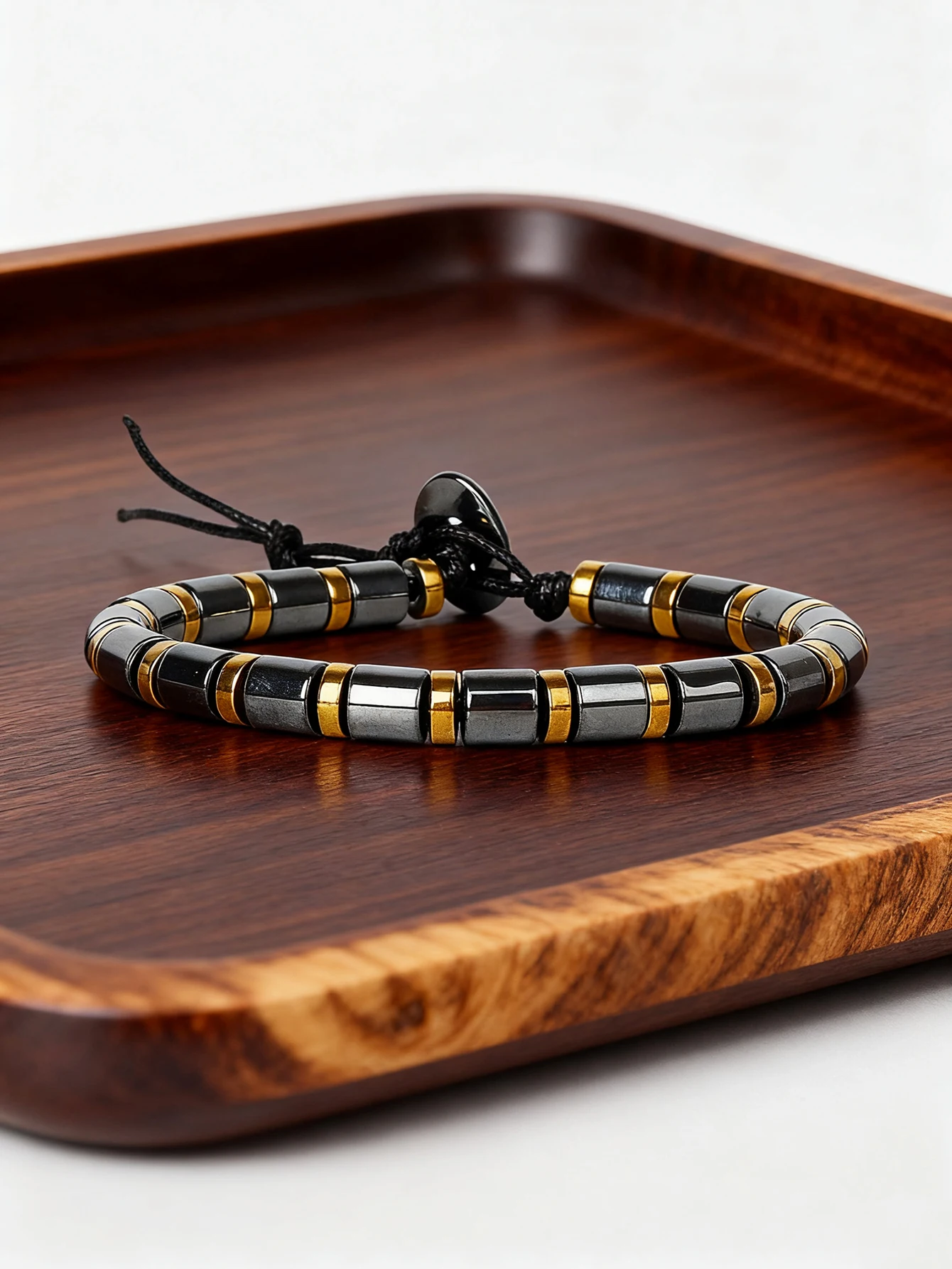 Hematite Stone Bracelet with Gold Spacers and Leather Cord - Image 4