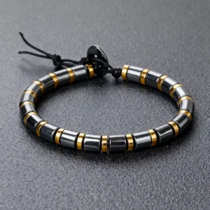 Hematite Stone Bracelet with Gold Spacers and Leather Cord - Image 1